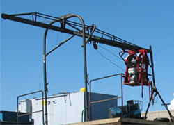 Front view of a trolley track hoist.